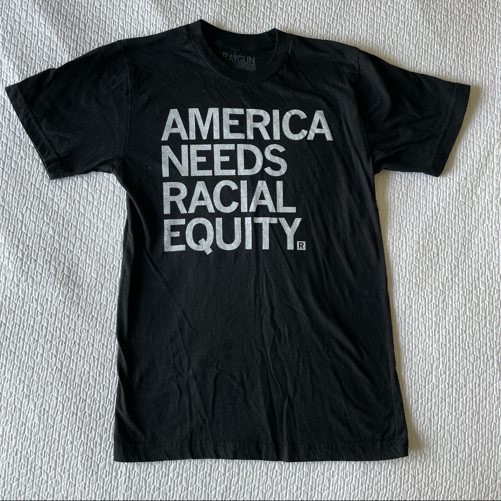 4/$10 - RAYGUN | America Needs Racial Equity Tee